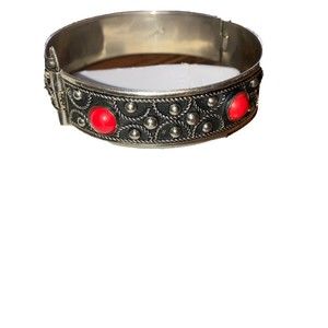 Faux  coral Silvertone alpaca hinged bangle bracelet